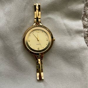 Women’s gold Quartz watch